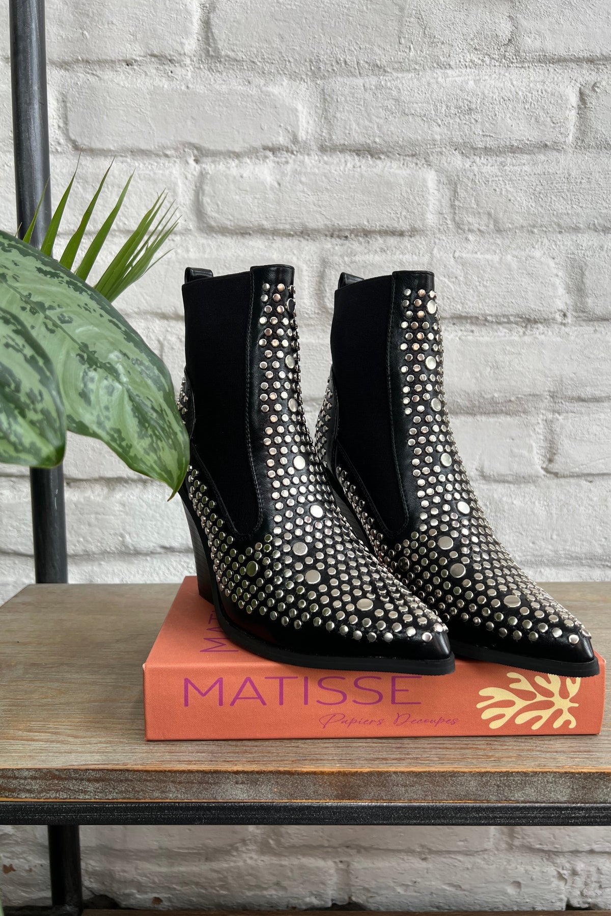 BOTAS TACHES NEGRAS