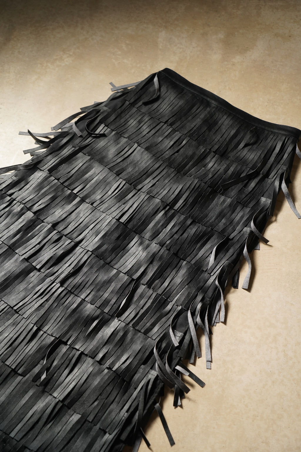 FALDA FLECOS CUERINA